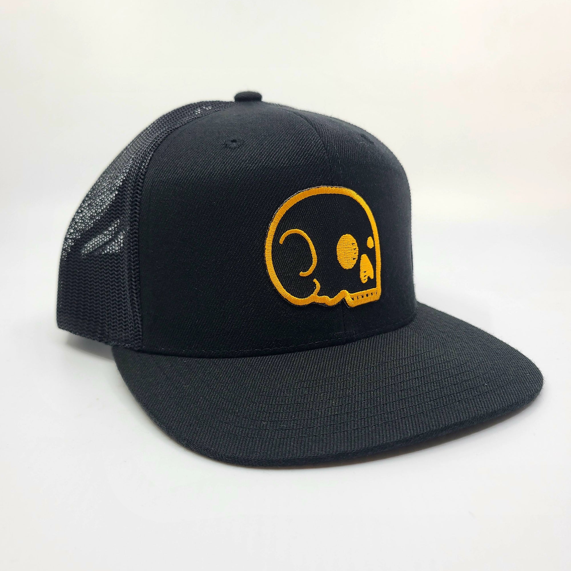Dos en maille – Noir avec crâne noir/jaune.